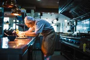 Best town to work in - chef preparing meal in kitchen