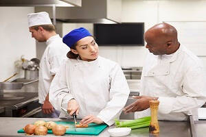 8 ways to train as a Chef for free; chefs working in the kitchen