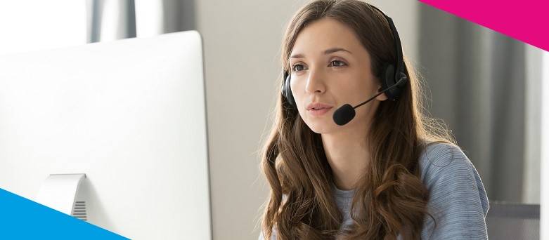 An office worker on the phone and browsing online
