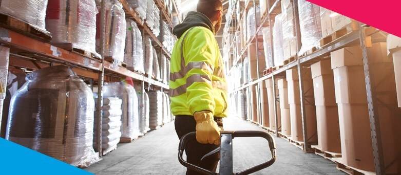 Warehouse Career Prospects  - Male Warehouse Operative, pulling a pallet 