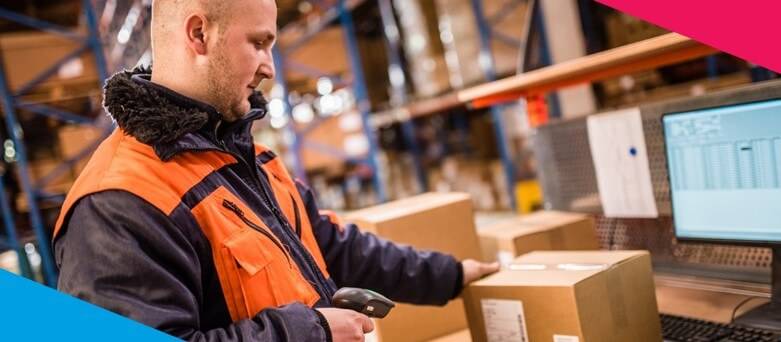 Warehouse Operative Job Description - Male Warehouse Operative Scanning a box